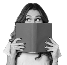 Portrait of a pretty young girl hiding behind an open book and looking away isolated over gray wall background