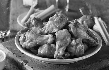 Spicy Homemade Buffalo Wings with Dip and Beer